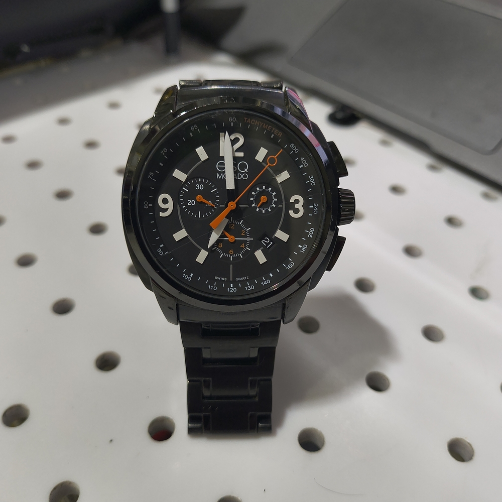 Movado Black Watch with Orange Accents